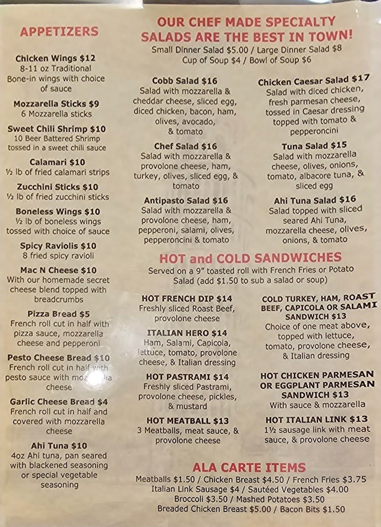Pizza slices beside a salad bar.